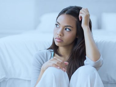 woman sitting alone