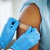 Here’s How Long Before Travel & Parties You Need to Get Your Vaccines, Says Research